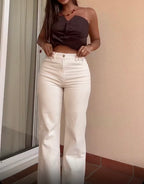 Jean Creamy à détails dorés